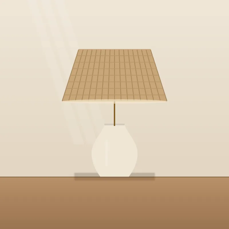 Rattan table lamp on a cream ceramic base