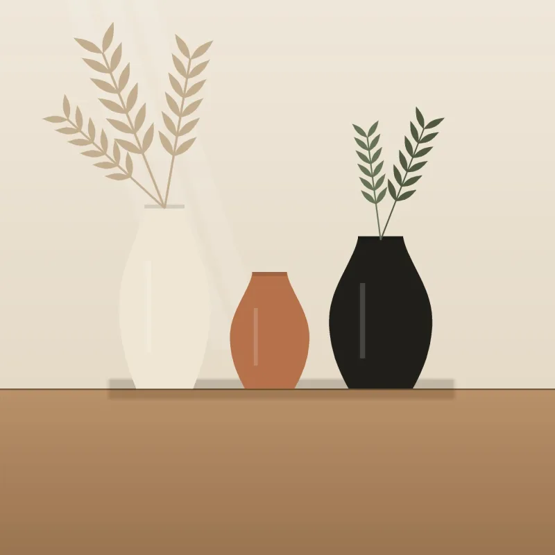 Cream, terracotta and black ceramic vases with dried stems